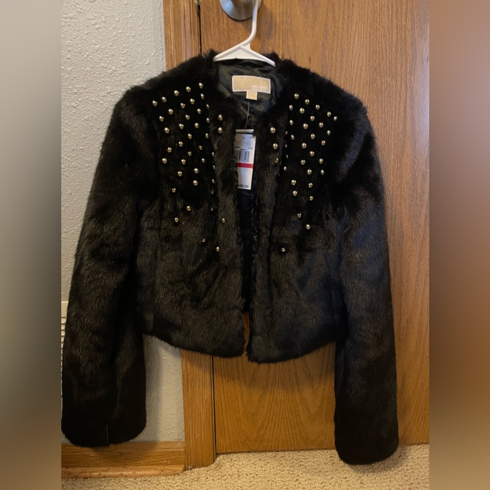 Never worn and w/ tags Michael Kors faux fur black jacket w/ gold embellishments